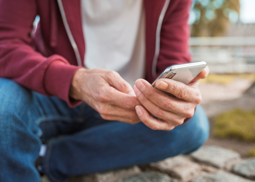 person holding a mobile phone